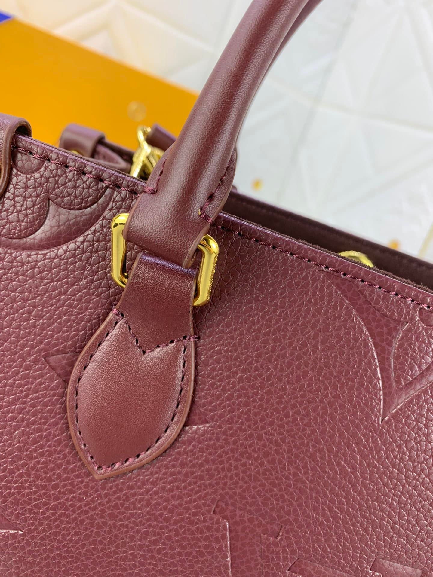L0vis Vvtt0n Onthego Mm Monogram Empreinte Wine Red 25Cm M46601